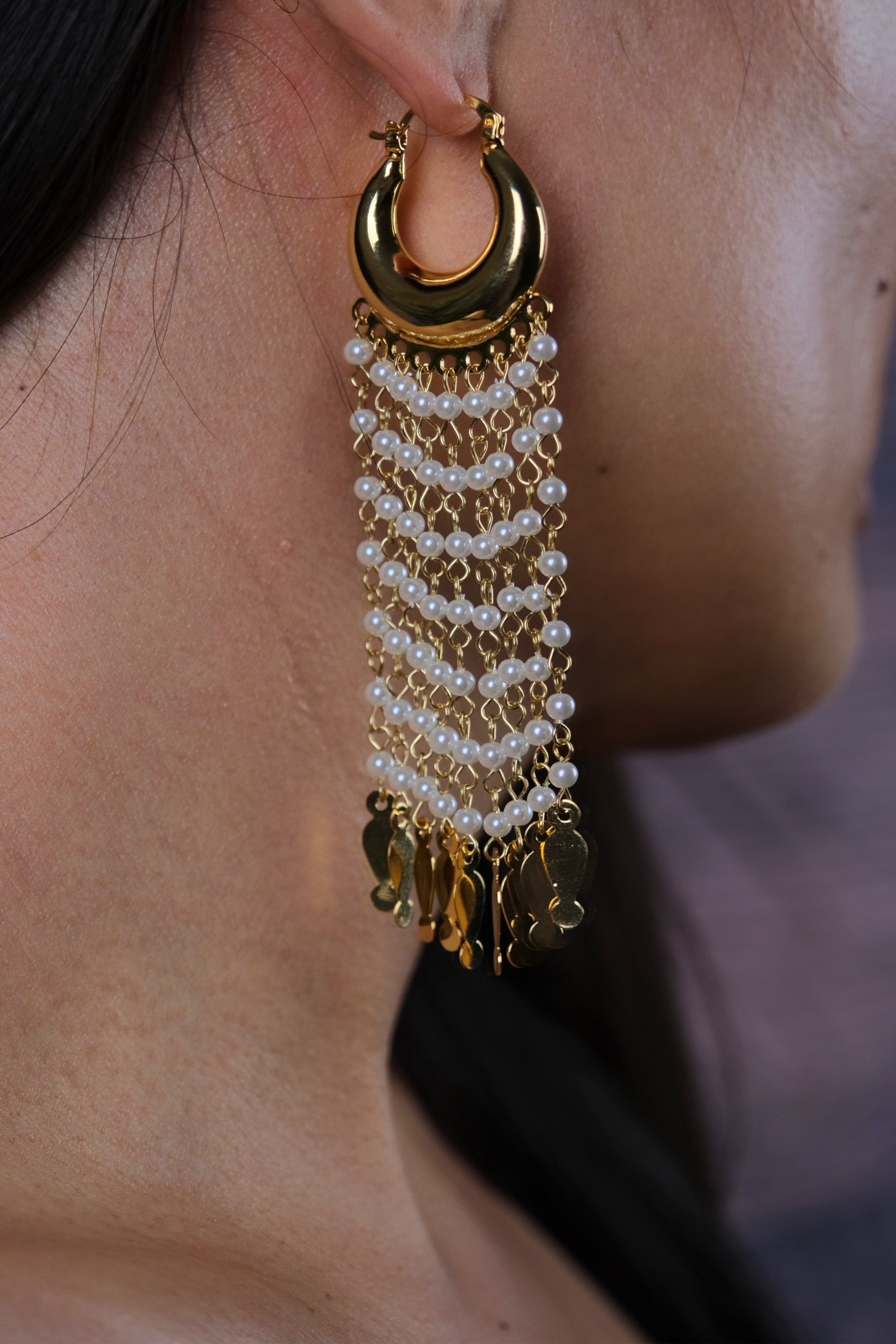 une image de bouche d’oreille de perle 